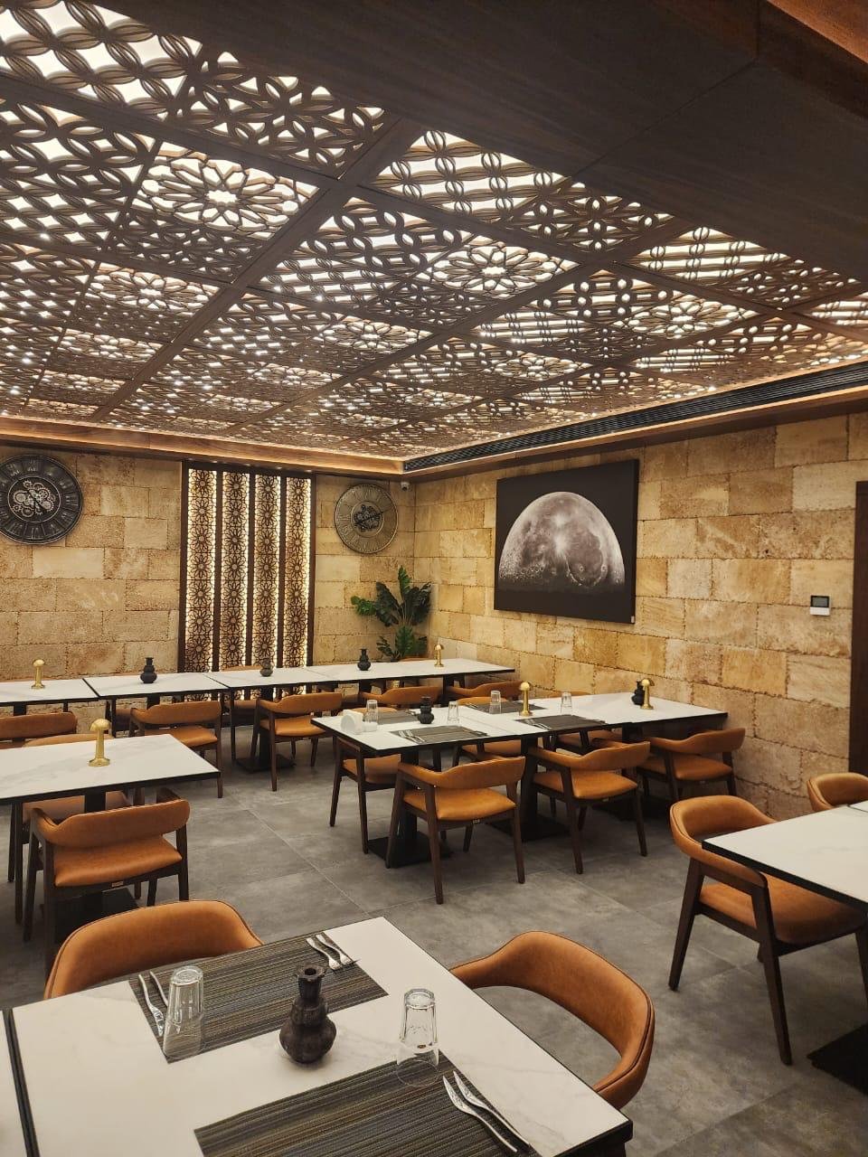 Private villa living room paneling and concealed doors, Abu Dhabi
